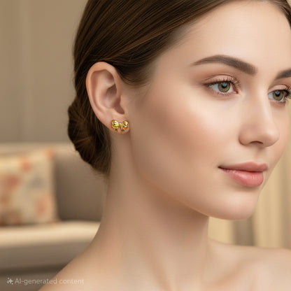Bow earring in matt Gold polish