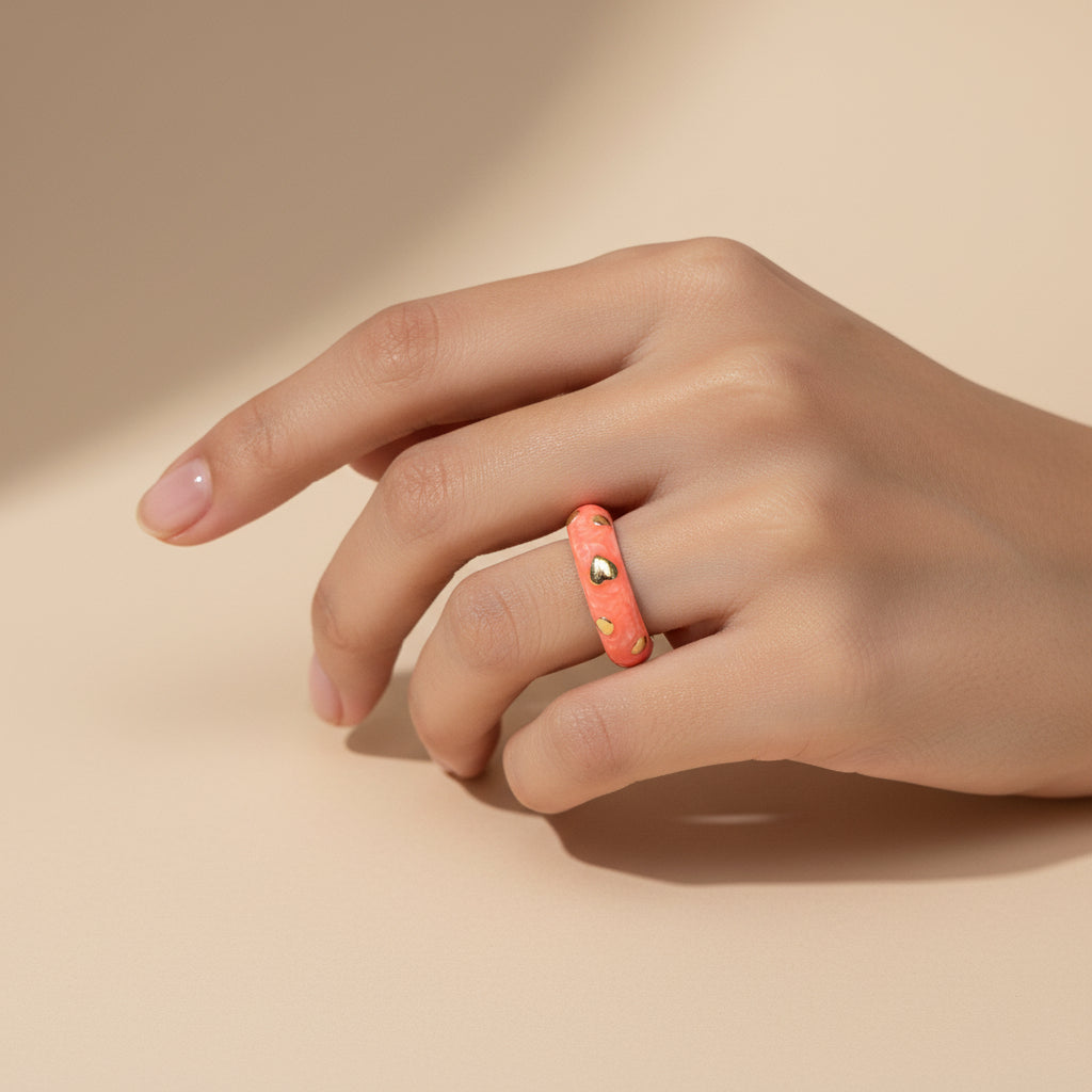 Pink ring with gold hearts 